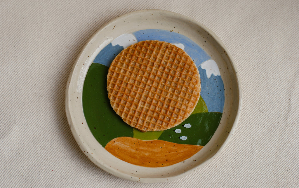 whimsical ceramic plate inspired by a journey home