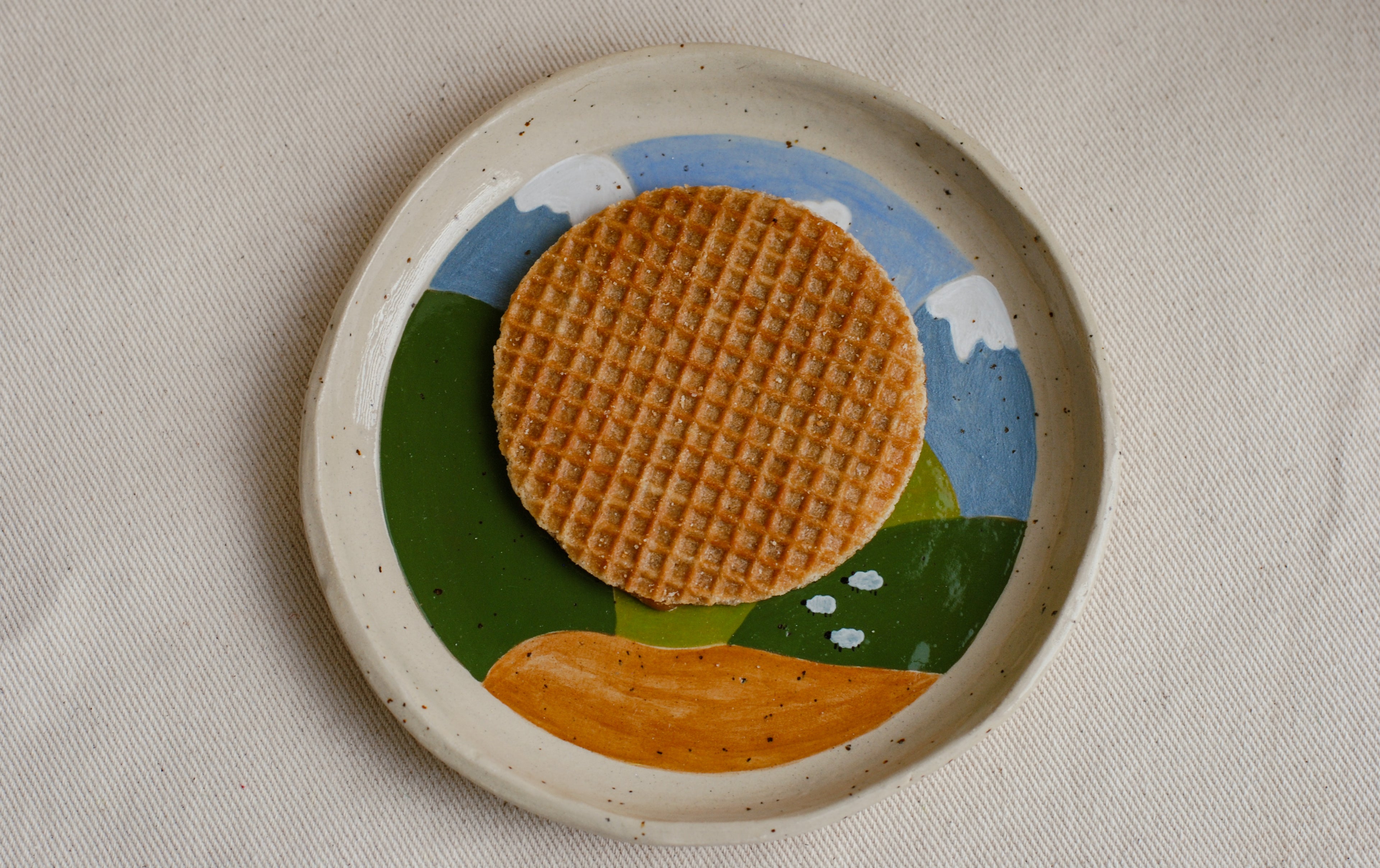 whimsical ceramic plate inspired by a journey home