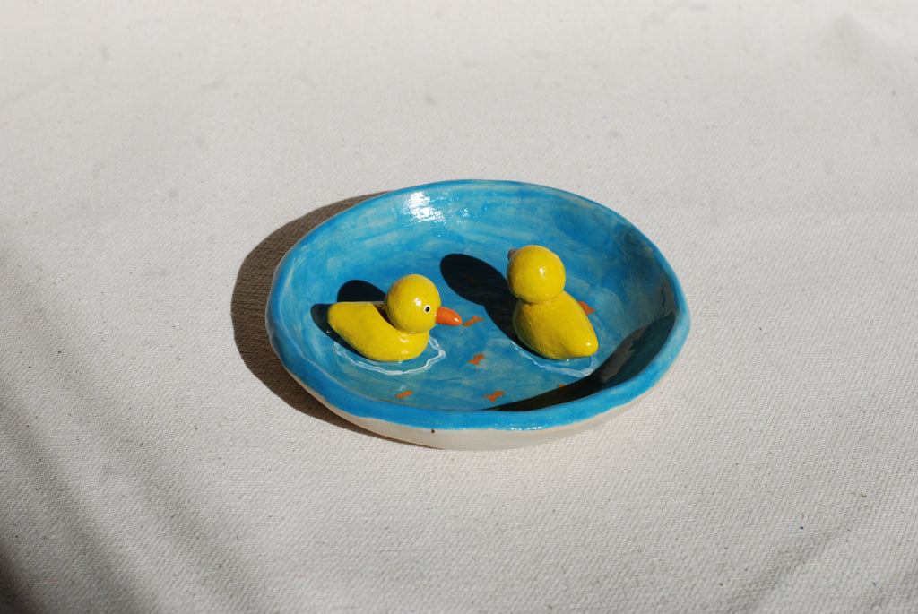 handmade ceramic trinket dish with hand-painted duck pond scene, whimsical stoneware netherlands 