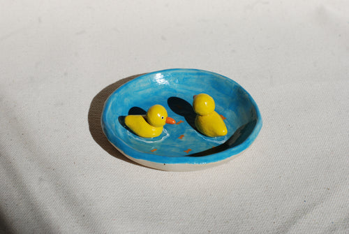 handmade ceramic trinket dish with hand-painted duck pond scene, whimsical stoneware netherlands 