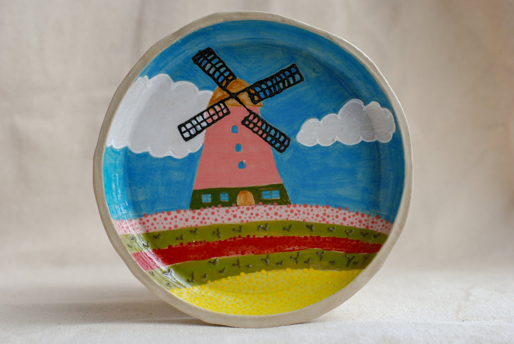 handmade ceramic plate with pink windmill illustration