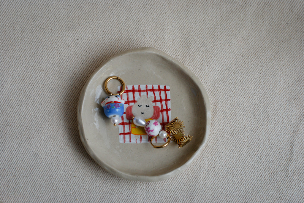 sleepy bunny ceramic dish detail, cute handmade pottery pipa pots