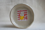 handmade ceramic trinket dish with hand-painted sleeping bunny, whimsical stoneware Netherlands